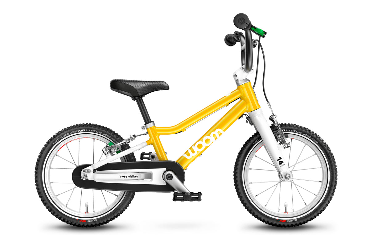 Woom 2 Kinderfahrrad 14 Zoll in Gelb, gebraucht bei kidsbikeoutlet.de