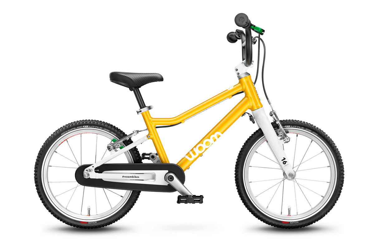 Woom 3 Kinderfahrrad 16 Zoll in Gelb, gebraucht bei kidsbikeoutlet.de